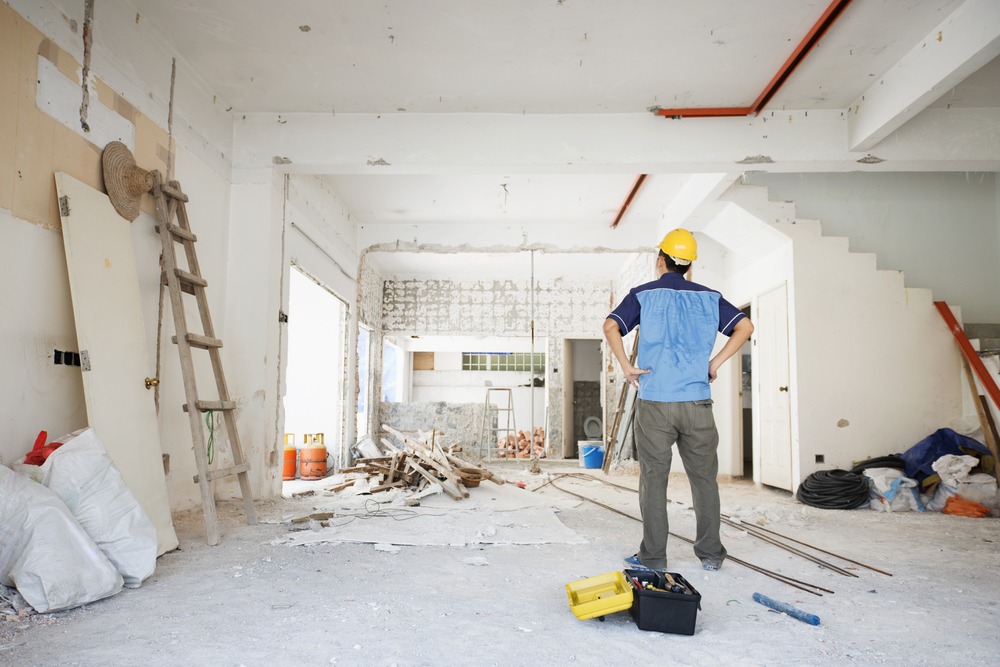 House,Improvement,Concept.,Rear,View,Of,Asian,Construction,Worker,Looking